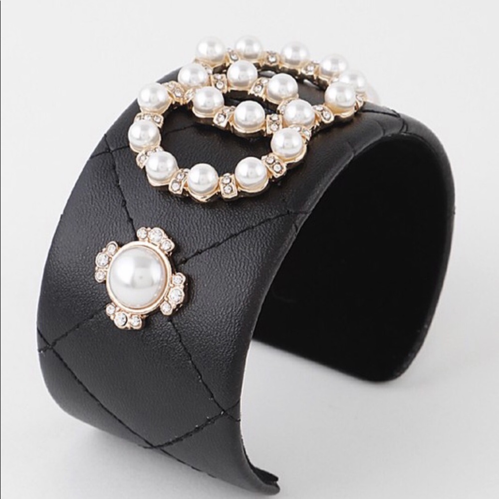 Open black bleary/gold studded bracelets